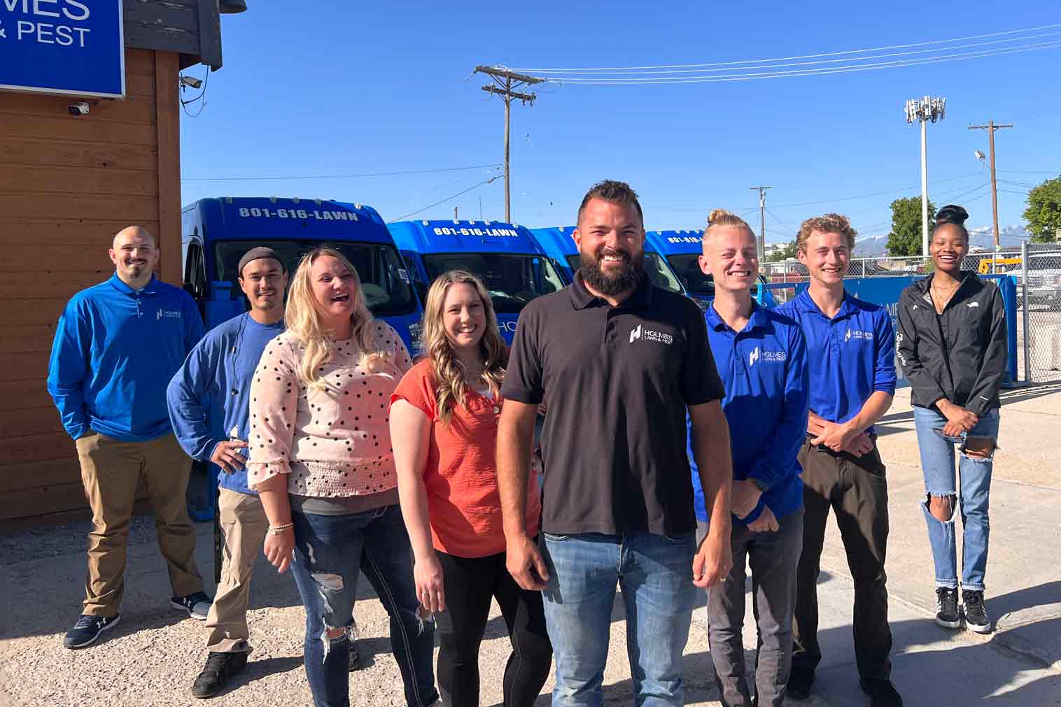 Company staff outside scaled